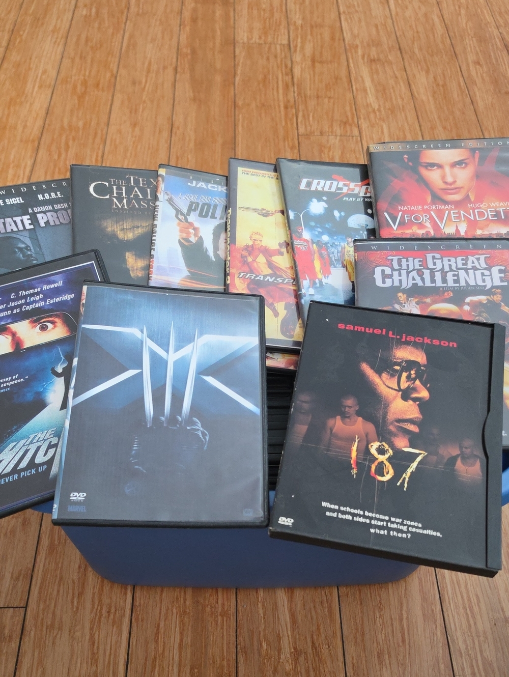 Assorted Black DVD Movie Cases - Mixed Titles